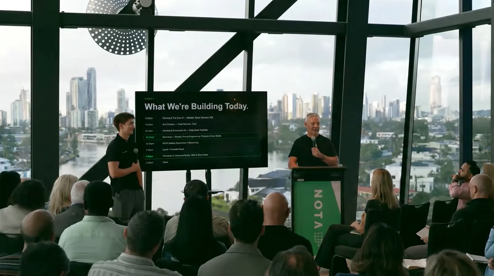 Will Burns presenting on stage